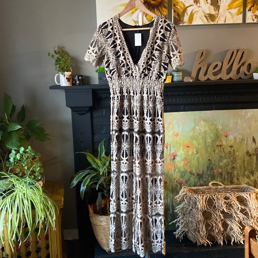 Small tan on black lace romper